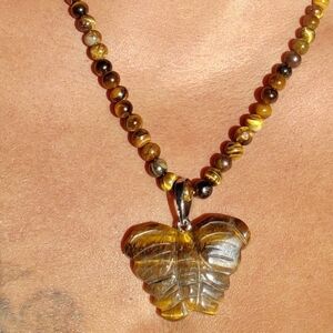 Hand Carved Tigers eye butterfly necklace 20 in